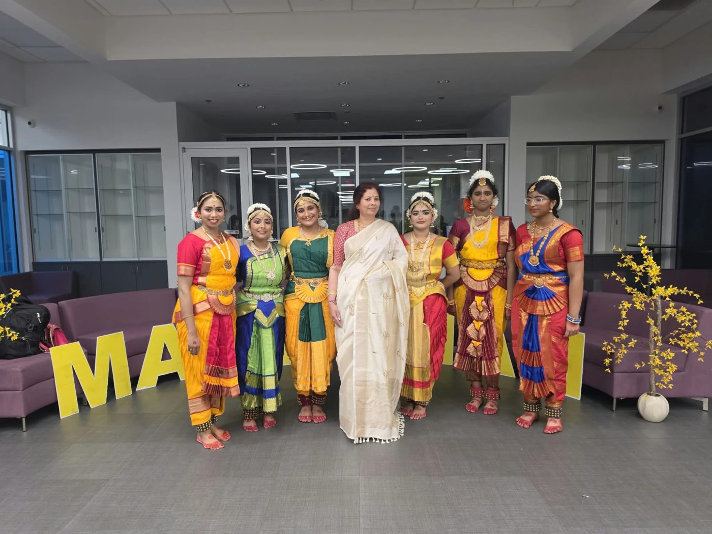 Sumathi with her students in costume
