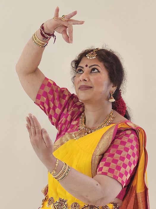 Classical pose in yellow costume
